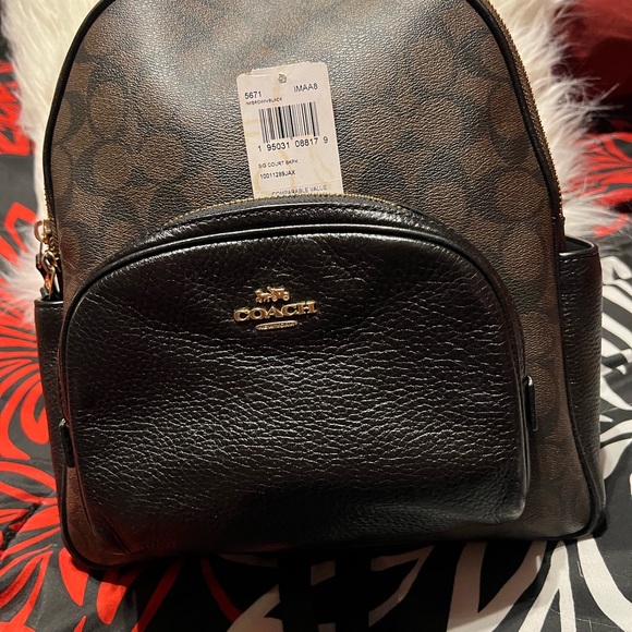 Coach backpack , carried a few times . No marks , tears or scuffs. - Picture 10 of 10